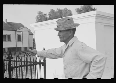 [Untitled photo, possibly related to: Tomb painter in cemetery at…, Louisiana, 1935