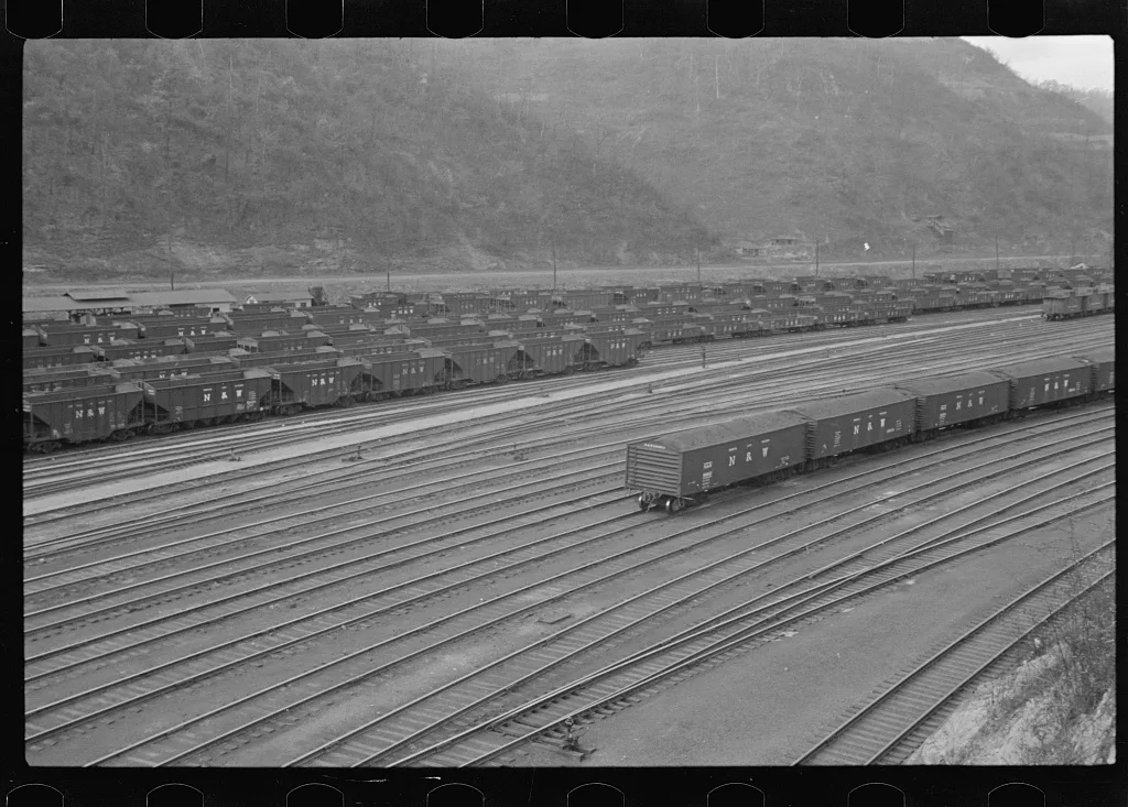 [Untitled photo, possibly related to: Coal cars in railroad yard at…, West Virginia, 1935