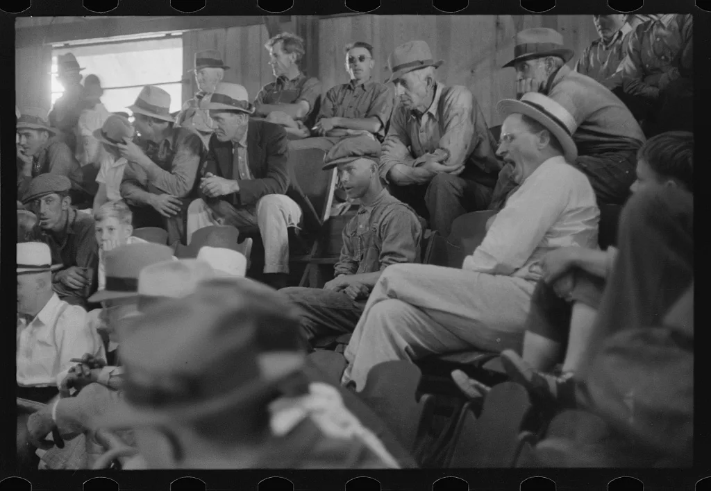 Men at auction room, Pickaway Livestock Cooperative Association, Ohio, 1938