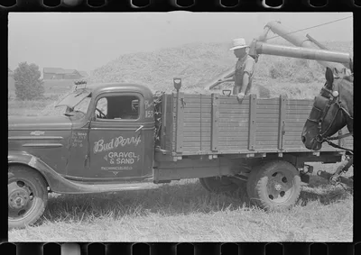 Filling truck with threshed grain, central Ohio (see general caption), 1938