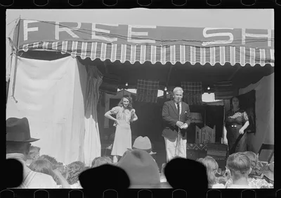 [Untitled photo, possibly related to: Ashville, Ohio. Sideshows at…, 1938