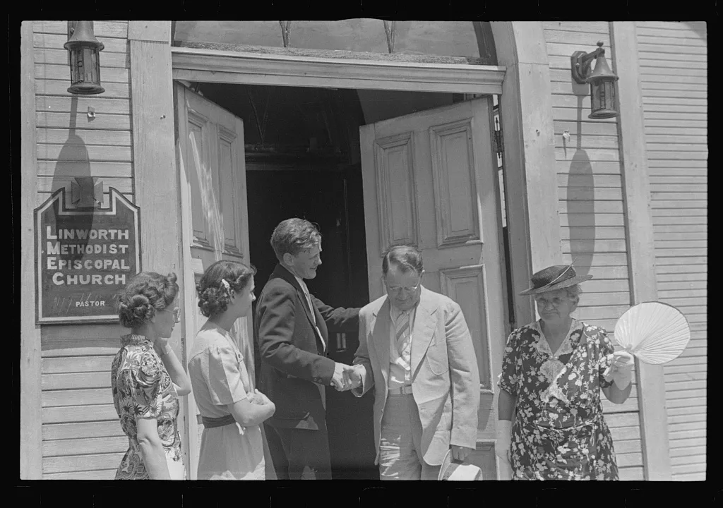 Pastor greeting his parishioners, Linworth, Ohio, 1938