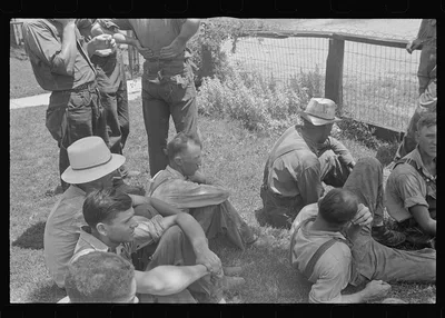[Untitled photo, possibly related to: Part of threshing crew, waiting…, Ohio, 1938