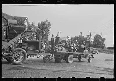 Moving combine and tractor, central Ohio (see general caption), 1938