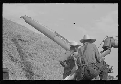 [Untitled photo, possibly related to: Two members of threshing crew,…, Ohio, 1938