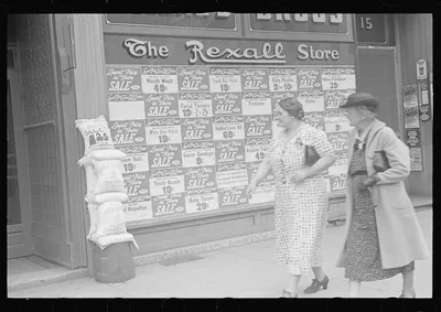 [Untitled photo, possibly related to: Drugstore window, Newark, Ohio], 1938