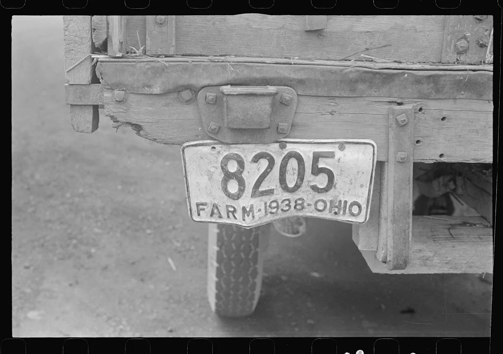 On Route 40, central Ohio moving combine and tractor (see general…, 1938