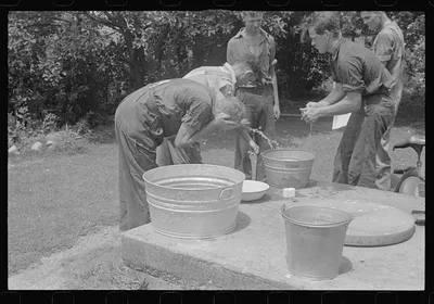 [Untitled photo, possibly related to: Washing up before dinner during…, Ohio, 1938