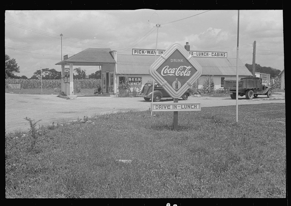 Filling station and road signs in central Ohio  (see general caption), 1938