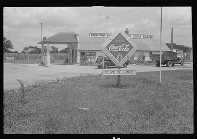 Filling station and road signs in central Ohio  (see general caption), 1938