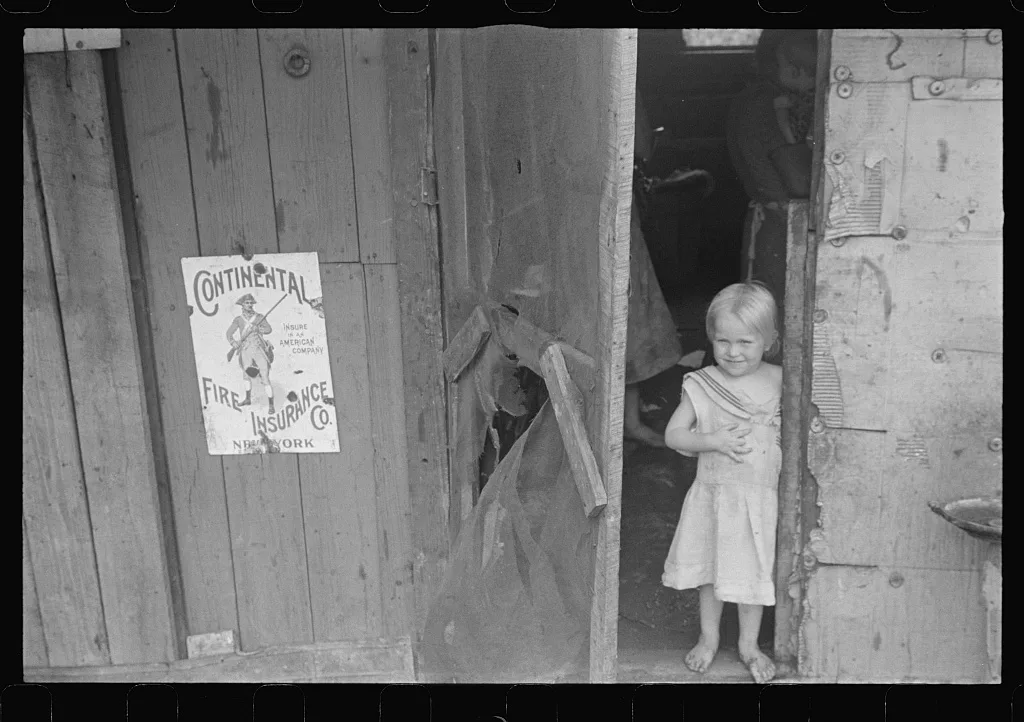 [Untitled photo, possibly related to: Child of ex-farmer now on…, Ohio, 1938