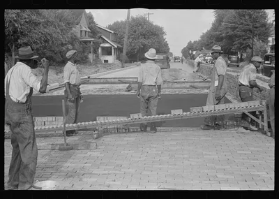 Workmen repairing Route 40, central Ohio, 1938