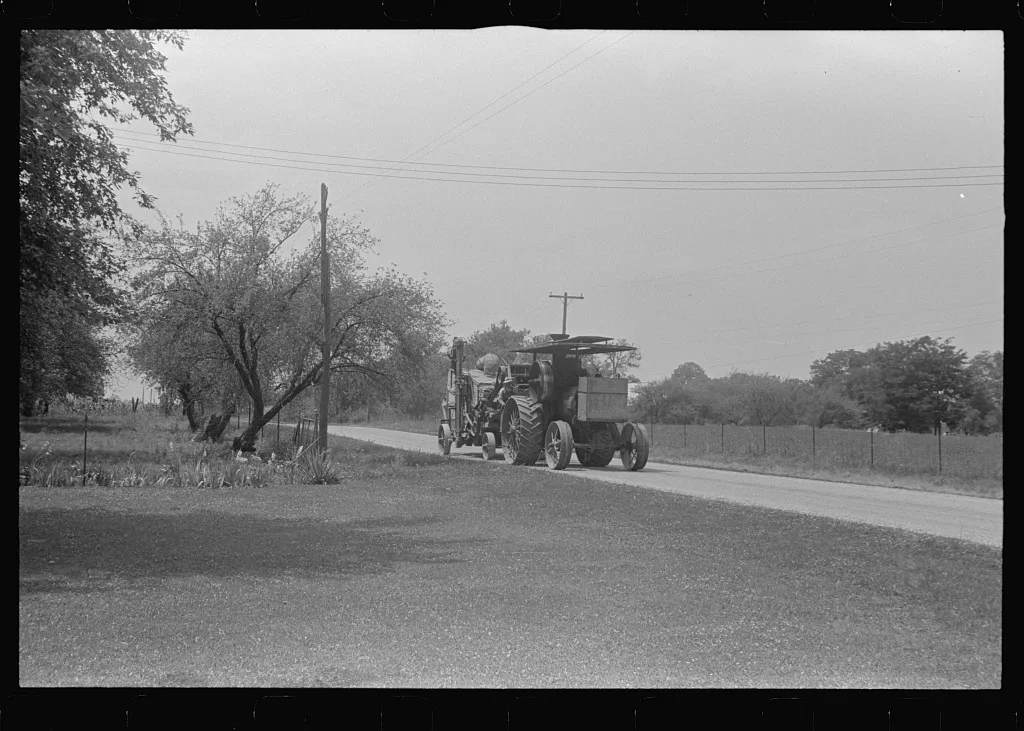 Steam thresher. These machines move from job to job under their own…, Ohio, 1938