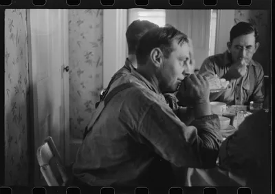 [Untitled photo, possibly related to: Dinner during wheat harvest…, Ohio, 1938