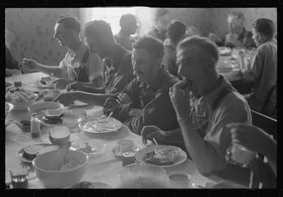 [Untitled photo, possibly related to: Dinner during wheat harvest…, Ohio, 1938