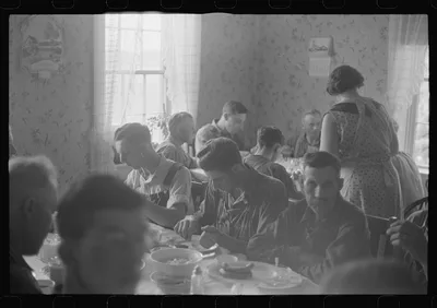 Dinner during wheat harvest time, central Ohio, 1938