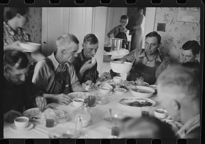 [Untitled photo, possibly related to: Dinner during wheat harvest…, Ohio, 1938