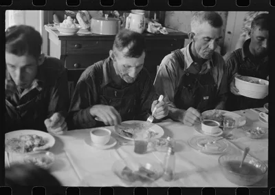 [Untitled photo, possibly related to: Dinner during wheat harvest…, Ohio, 1938