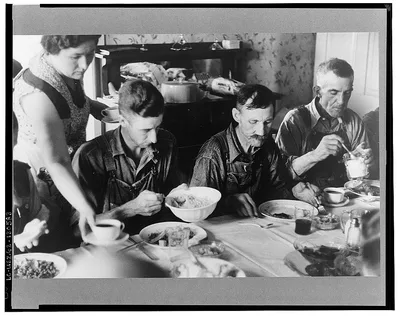 Dinner during wheat harvest time, central Ohio, 1938