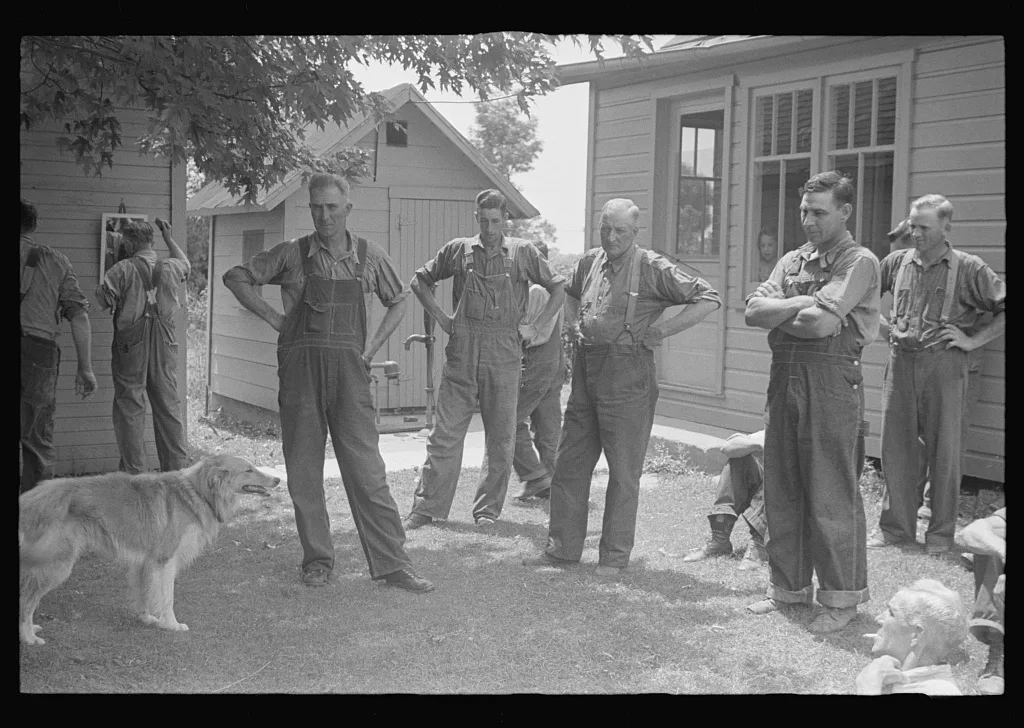Waiting around before dinner during wheat harvest, central Ohio, 1938