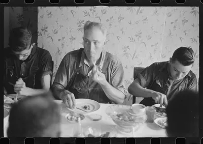 [Untitled photo, possibly related to: Dinner during wheat harvest…, Ohio, 1938