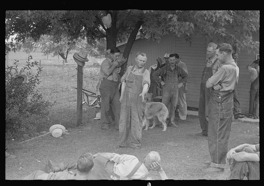 Political forum before dinner during wheat harvest, central Ohio, 1938
