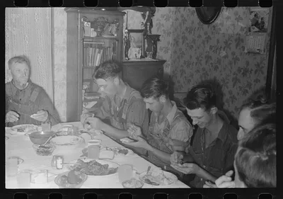 [Untitled photo, possibly related to: Dinner during wheat harvest…, Ohio, 1938