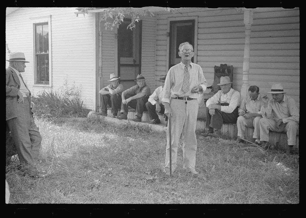 Spectators at farmland auction, New Carlisle [i.e. Marysville], Ohio, 1938