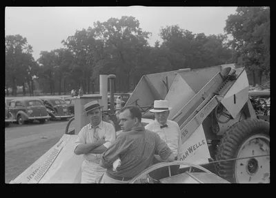 [Untitled photo, possibly related to: Attendant at farm machine…, Ohio, 1938