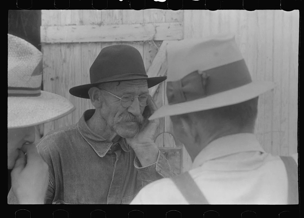 Farmers at public auction, central Ohio, 1938