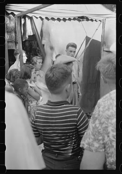 [Untitled photo, possibly related to: Spectators at county fair,…, Ohio, 1938