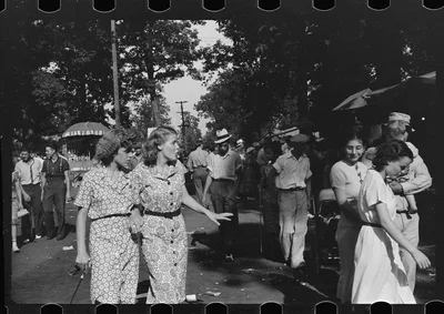 [Untitled photo, possibly related to: Spectators at sideshow, county…, Ohio, 1938