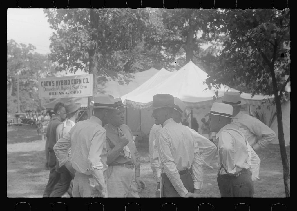 Farmers talking at county fair, central Ohio, 1938