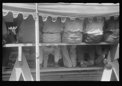Spectators at sideshow, county fair, central Ohio, 1938